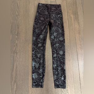 Lululemon Black and Metallic Foil print Leggings
